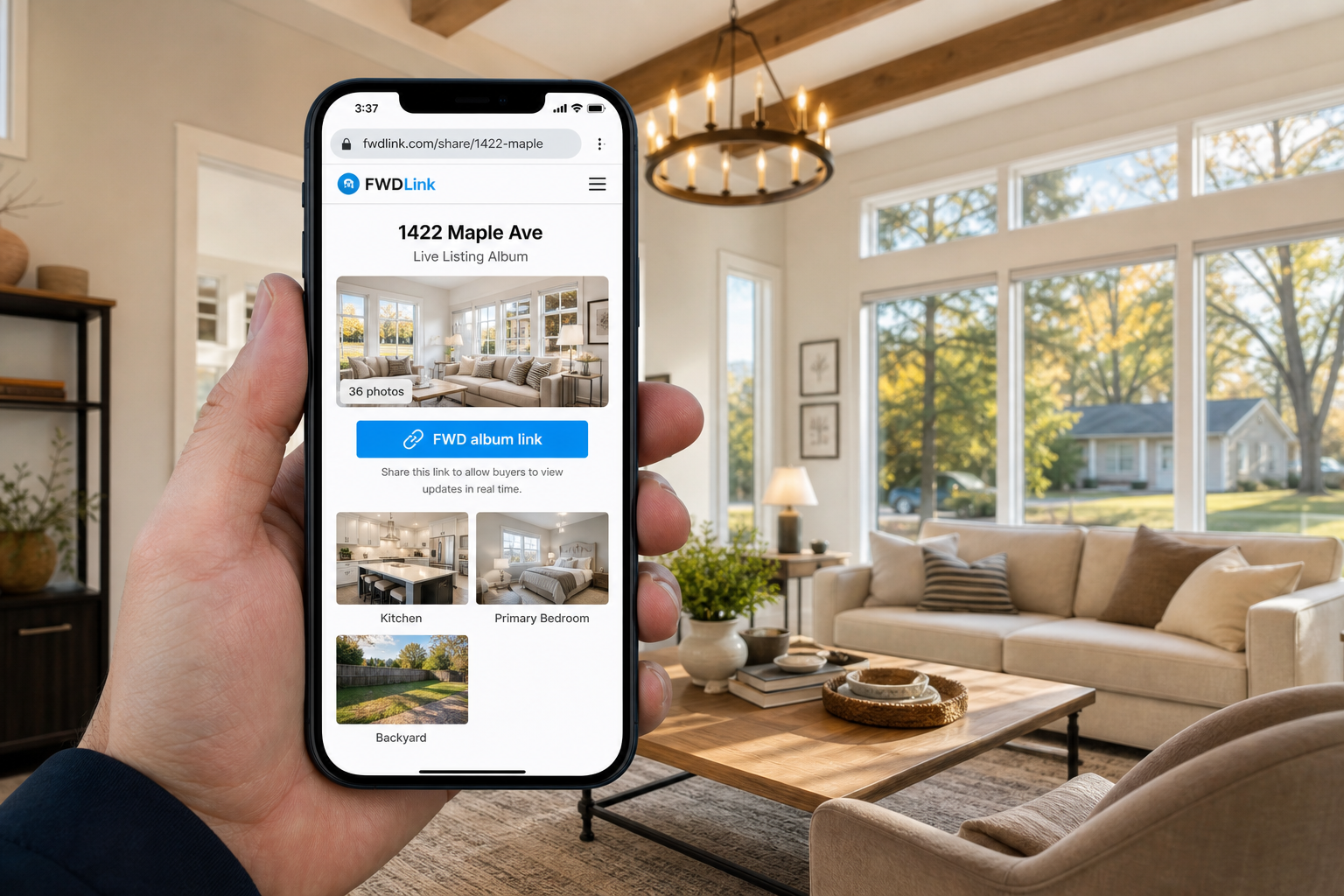 Realtor holding a phone with a live FWDLink listing album for 1422 Maple Ave